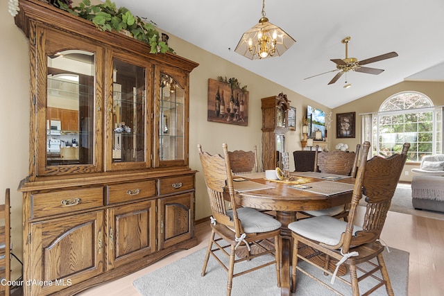 635 N Divot Ave, Post Falls, ID 83854 - dining space featuring light wood-style flooring, lofted ceiling, a ceiling fan, and a chandelier