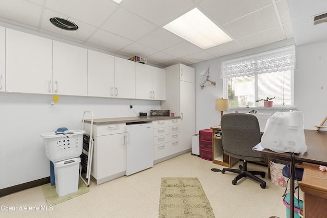 635 N Divot Ave, Post Falls, ID 83854 - home office with a drop ceiling and light flooring