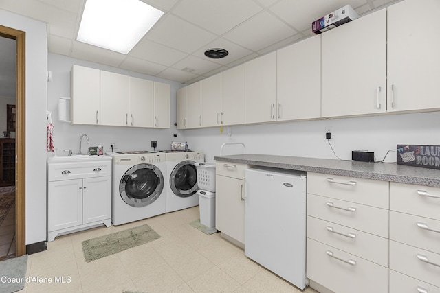 635 N Divot Ave, Post Falls, ID 83854 - laundry area with washing machine and clothes dryer and cabinet space