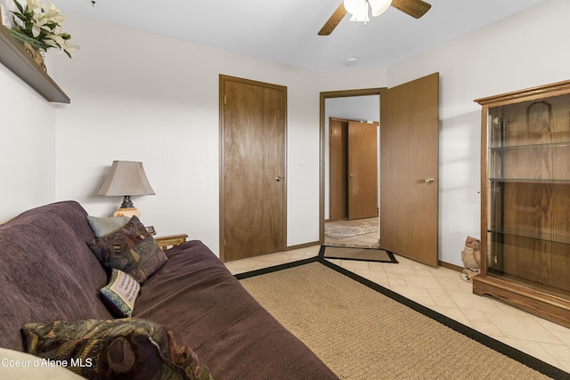 635 N Divot Ave, Post Falls, ID 83854 - living area with ceiling fan and light tile patterned flooring