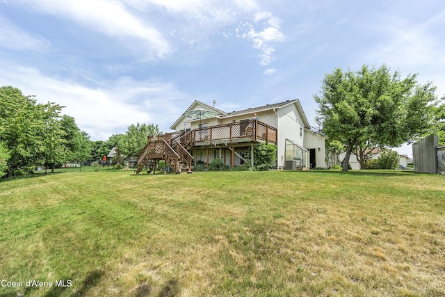 635 N Divot Ave, Post Falls, ID 83854 - view of grassy yard featuring stairs and a deck
