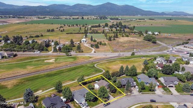 635 N Divot Ave, Post Falls, ID 83854 - aerial overview of property's location with property parcel outlined and a mountain backdrop