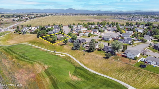 635 N Divot Ave, Post Falls, ID 83854 - aerial view of residential area featuring property parcel outlined and a mountain backdrop