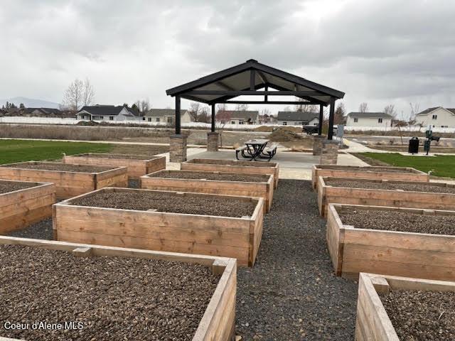 7881 N Mocha Loop, Coeur Dalene, ID 83815 - surrounding community featuring a gazebo and a garden