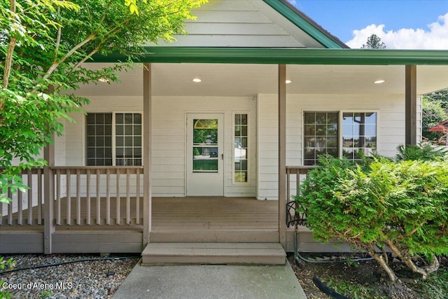 879 E Cloverleaf Dr, Hayden, ID 83835 - property entrance featuring a porch