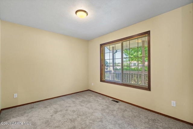 879 E Cloverleaf Dr, Hayden, ID 83835 - unfurnished room with carpet and baseboards