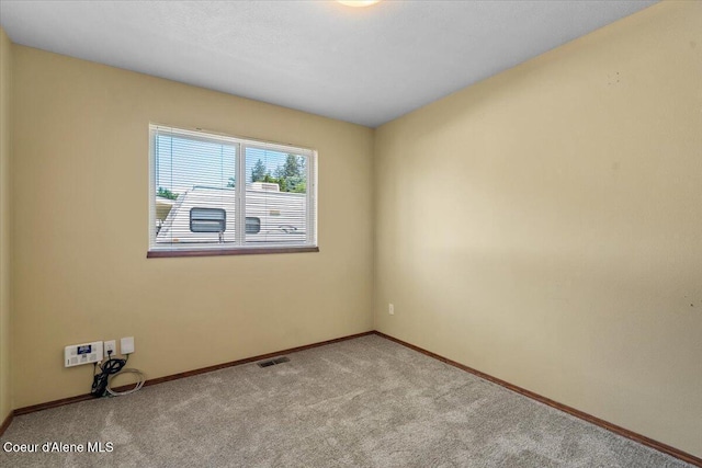 879 E Cloverleaf Dr, Hayden, ID 83835 - carpeted empty room featuring baseboards