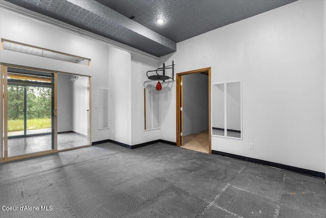 5239 E Dodd Rd, Hayden, ID 83835 - carpeted spare room with baseboards