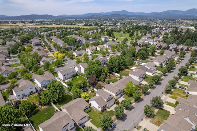 1817 N Chehalis St, Post Falls, ID 83854 - aerial perspective of suburban area with a mountainous background