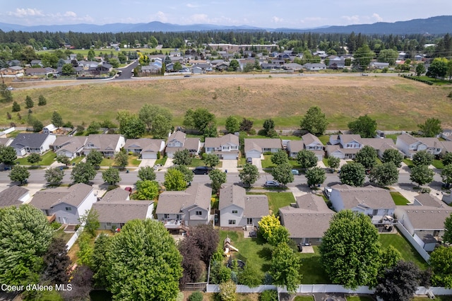 1817 N Chehalis St, Post Falls, ID 83854 - aerial view of residential area with a mountain backdrop