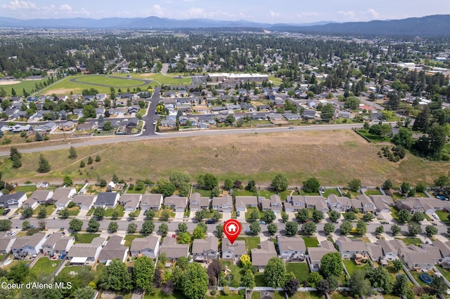 1817 N Chehalis St, Post Falls, ID 83854 - view of property location featuring mountains and nearby suburban area