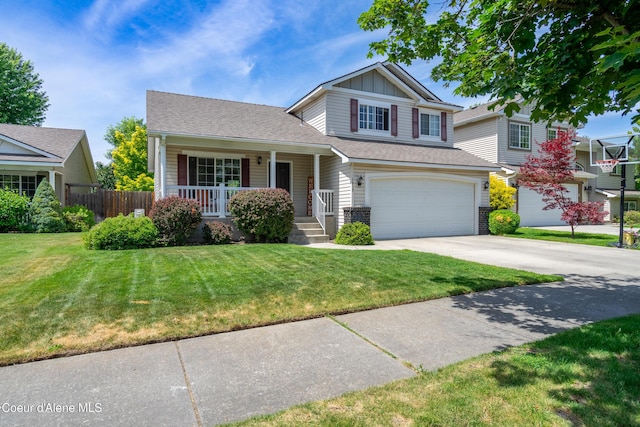 1817 N Chehalis St, Post Falls, ID 83854 - traditional home with a garage, driveway, board and batten siding, covered porch, and a shingled roof