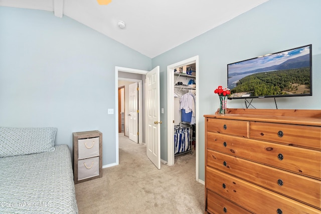1817 N Chehalis St, Post Falls, ID 83854 - bedroom featuring vaulted ceiling, light colored carpet, and a walk in closet