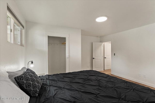 202 S 18th St, Coeur Dalene, ID 83814 - bedroom featuring light wood-type flooring and a closet