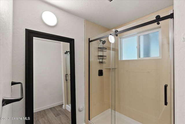 202 S 18th St, Coeur Dalene, ID 83814 - full bathroom with wood finished floors and a stall shower