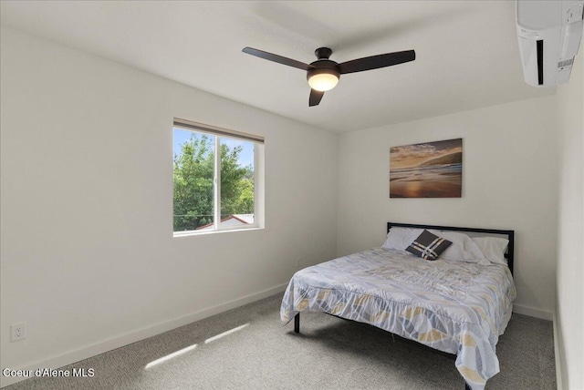 202 S 18th St, Coeur Dalene, ID 83814 - carpeted bedroom featuring a wall mounted AC and a ceiling fan