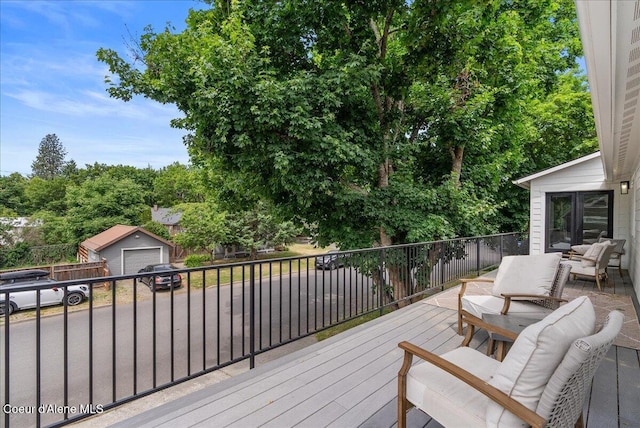 202 S 18th St, Coeur Dalene, ID 83814 - deck featuring a garage and an outbuilding