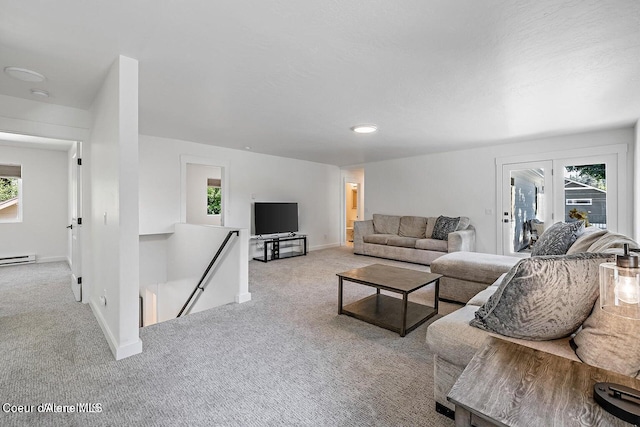 202 S 18th St, Coeur Dalene, ID 83814 - living room featuring carpet flooring, healthy amount of natural light, and a baseboard heating unit