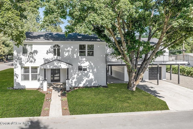 202 S 18th St, Coeur Dalene, ID 83814 - view of front of house with a garage, a front yard, and concrete driveway