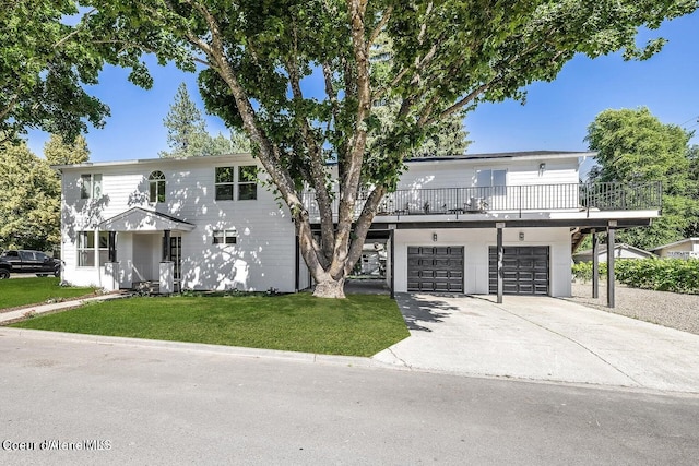 202 S 18th St, Coeur Dalene, ID 83814 - view of front of house with an attached garage, driveway, and a front lawn