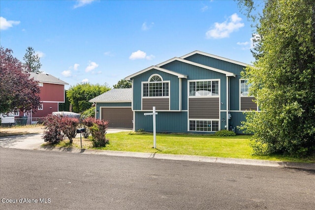 401 W 19th Ave, Post Falls, ID 83854 - view of front of house with a garage and concrete driveway