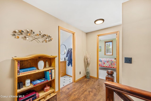 303 S 19th St, Coeur Dalene, ID 83814 - hallway featuring wood finished floors and baseboards