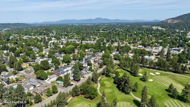 303 S 19th St, Coeur Dalene, ID 83814 - aerial view of residential area with a mountainous background and a golf club