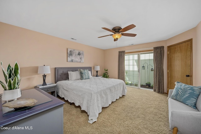 303 S 19th St, Coeur Dalene, ID 83814 - carpeted bedroom with access to exterior and ceiling fan
