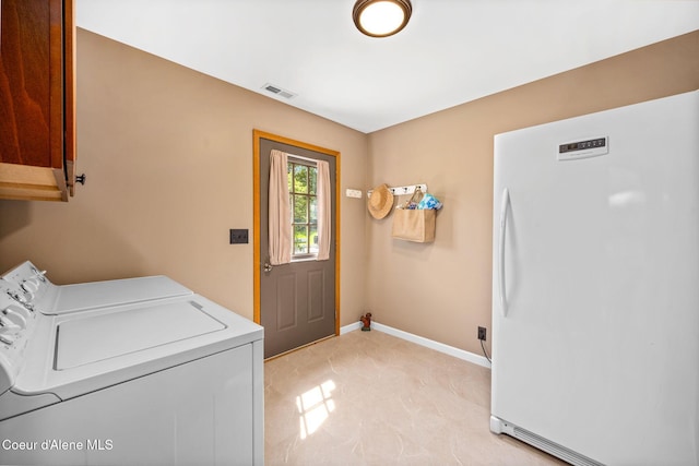 303 S 19th St, Coeur Dalene, ID 83814 - laundry area featuring washer and dryer, cabinet space, and light marble finish flooring