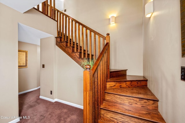303 S 19th St, Coeur Dalene, ID 83814 - staircase featuring carpet floors and baseboards