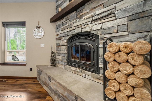 2130 E Bellamy Rd, Athol, ID 83801 - detailed view of wood finished floors and a fireplace
