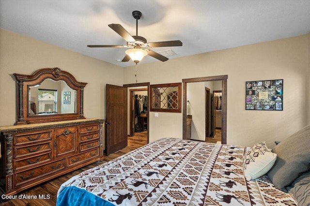 2130 E Bellamy Rd, Athol, ID 83801 - bedroom with wood finished floors, a walk in closet, a ceiling fan, ensuite bath, and a closet