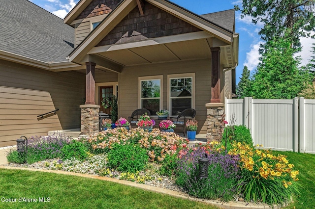1431 W Ashmont Way, Coeur Dalene, ID 83815 - view of exterior entry with roof with shingles