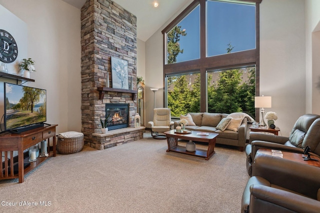 1431 W Ashmont Way, Coeur Dalene, ID 83815 - living room with a towering ceiling, carpet, and a fireplace