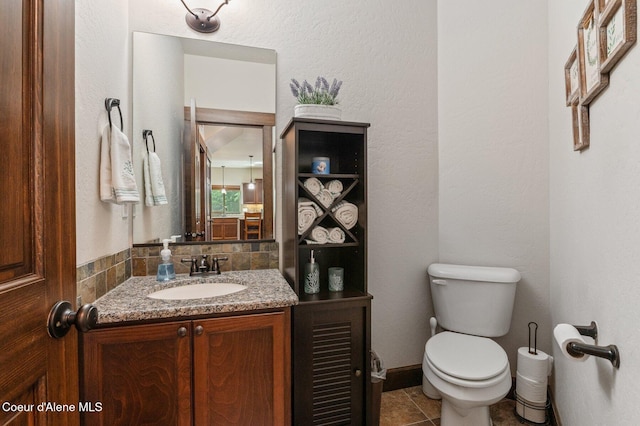 1431 W Ashmont Way, Coeur Dalene, ID 83815 - half bath featuring vanity and tile patterned floors