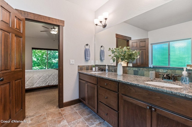 1431 W Ashmont Way, Coeur Dalene, ID 83815 - bathroom featuring double vanity, ceiling fan, ensuite bath, and vaulted ceiling