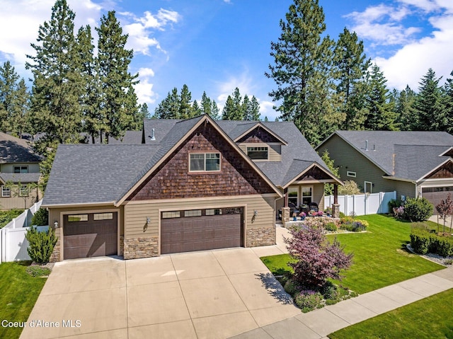1431 W Ashmont Way, Coeur Dalene, ID 83815 - craftsman house with stone siding, driveway, a garage, and a shingled roof