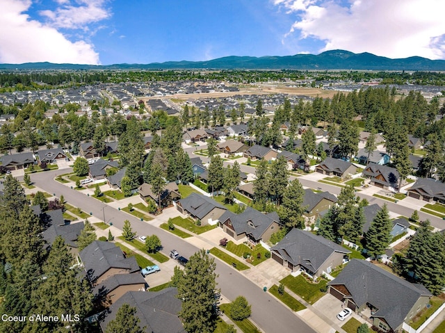 1431 W Ashmont Way, Coeur Dalene, ID 83815 - aerial view of residential area with mountains