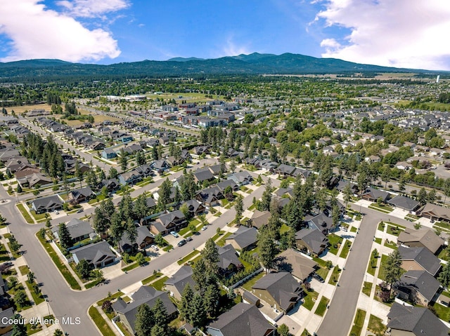 1431 W Ashmont Way, Coeur Dalene, ID 83815 - aerial view of property and surrounding area with mountains and nearby suburban area