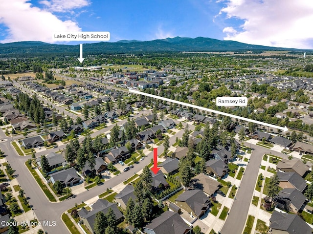 1431 W Ashmont Way, Coeur Dalene, ID 83815 - aerial view of property and surrounding area with a mountainous background and nearby suburban area
