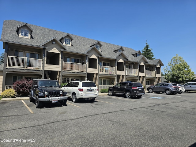 848 N Chase Rd # 102, Post Falls, ID 83854 - view of building exterior featuring uncovered parking