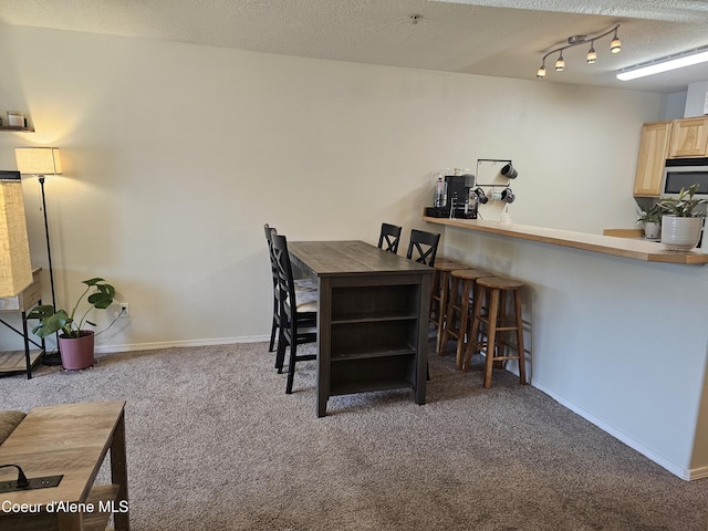 848 N Chase Rd # 102, Post Falls, ID 83854 - carpeted dining area featuring baseboards