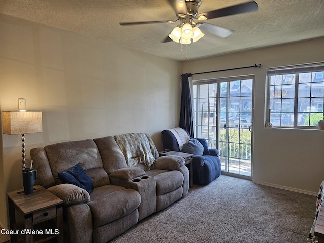 848 N Chase Rd # 102, Post Falls, ID 83854 - carpeted living area featuring a textured ceiling and ceiling fan