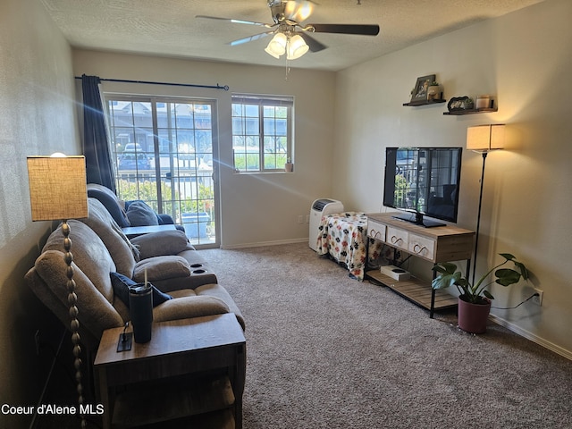 848 N Chase Rd # 102, Post Falls, ID 83854 - carpeted living room with ceiling fan and a textured ceiling