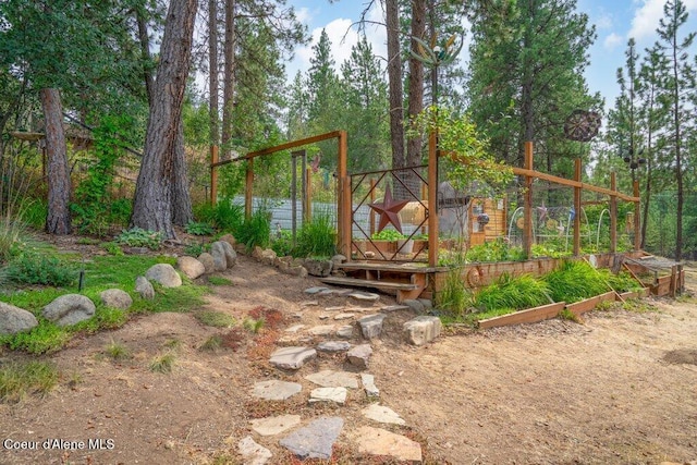 18914 W Riverview Dr, Post Falls, ID 83854 - view of yard with a vegetable garden
