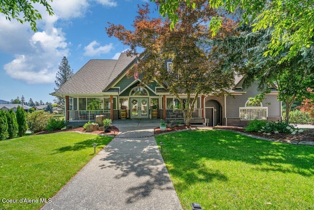 740 N Dundee Dr, Post Falls, ID 83854 - victorian-style house with french doors and a front yard