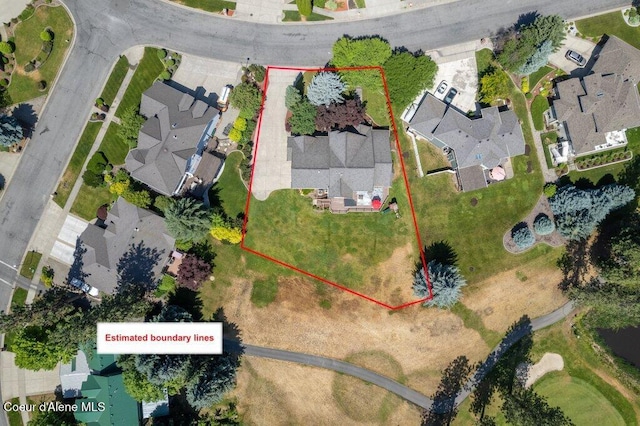 740 N Dundee Dr, Post Falls, ID 83854 - aerial view of residential area with property boundaries highlighted