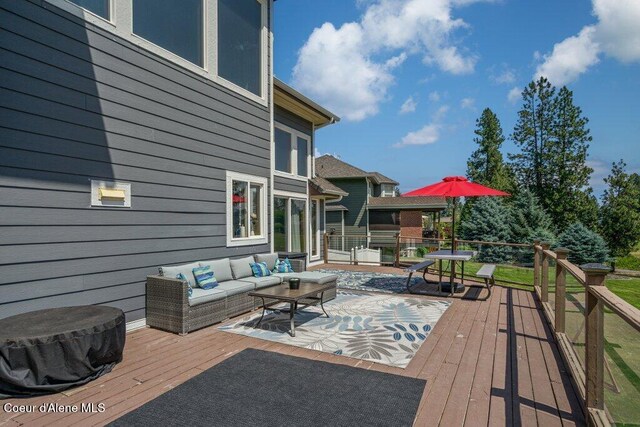 740 N Dundee Dr, Post Falls, ID 83854 - wooden deck featuring an outdoor hangout area