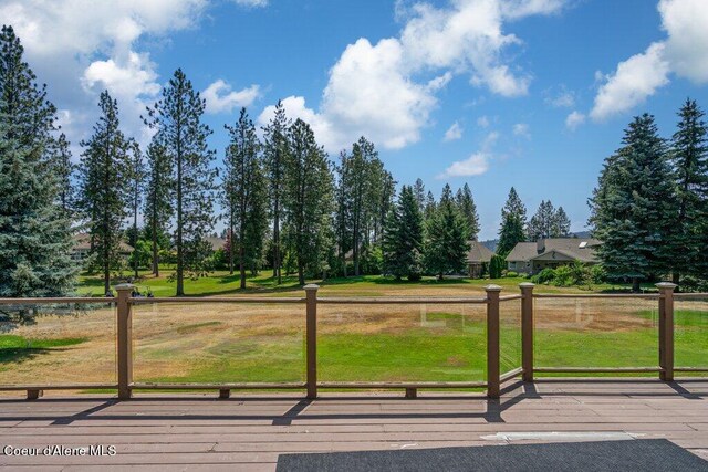 740 N Dundee Dr, Post Falls, ID 83854 - wooden terrace featuring a yard