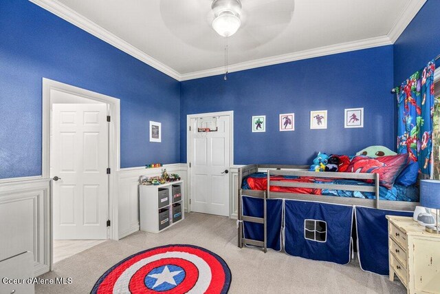 740 N Dundee Dr, Post Falls, ID 83854 - carpeted bedroom featuring ornamental molding, a wainscoted wall, and ceiling fan